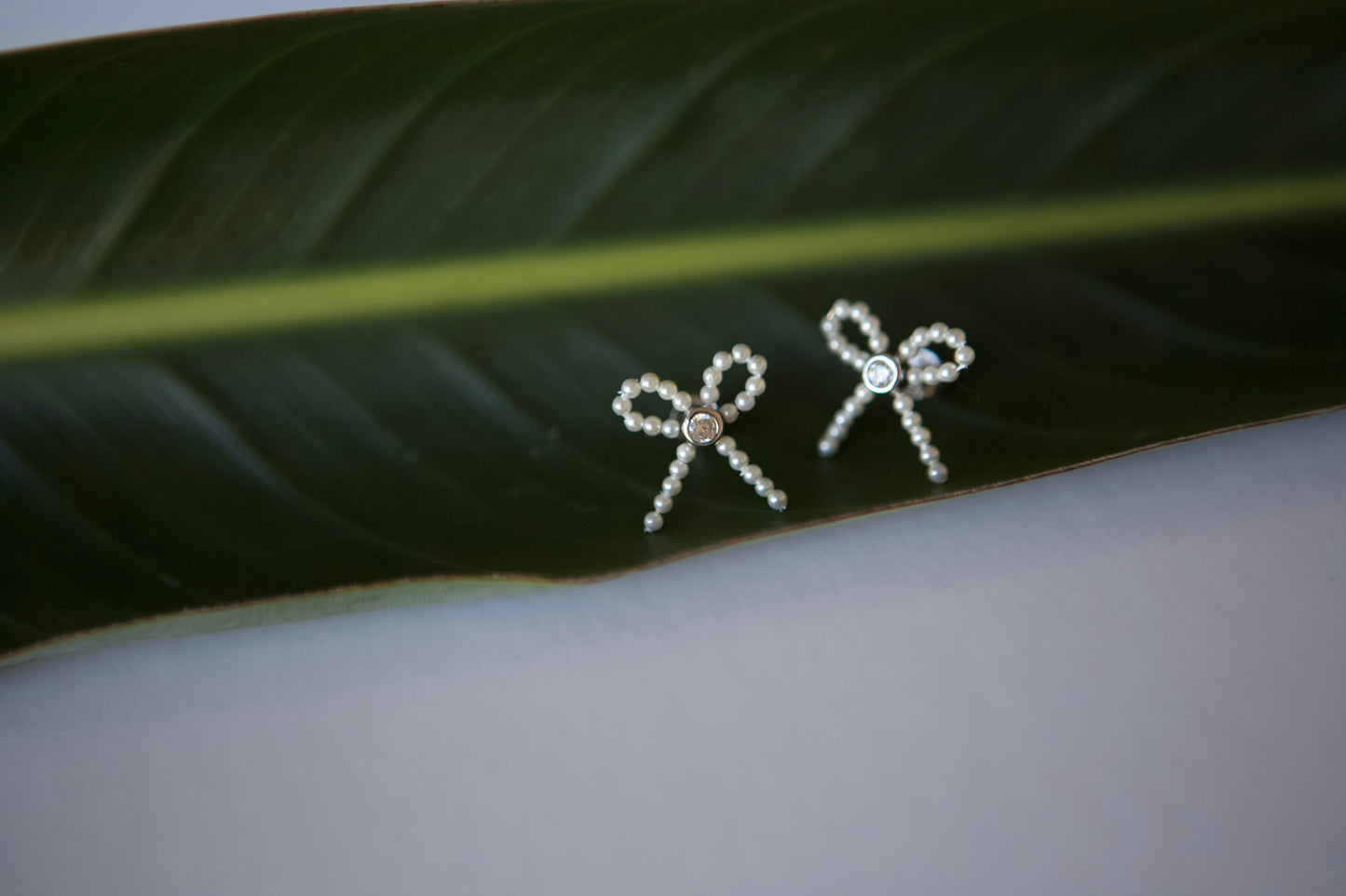 Tiny Pearl CZ Sterling Silver Bow Earrings